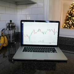 Laptop showing stock market data