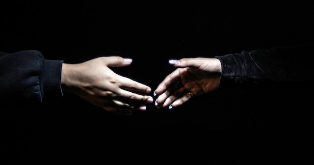 Two hands ready to shake